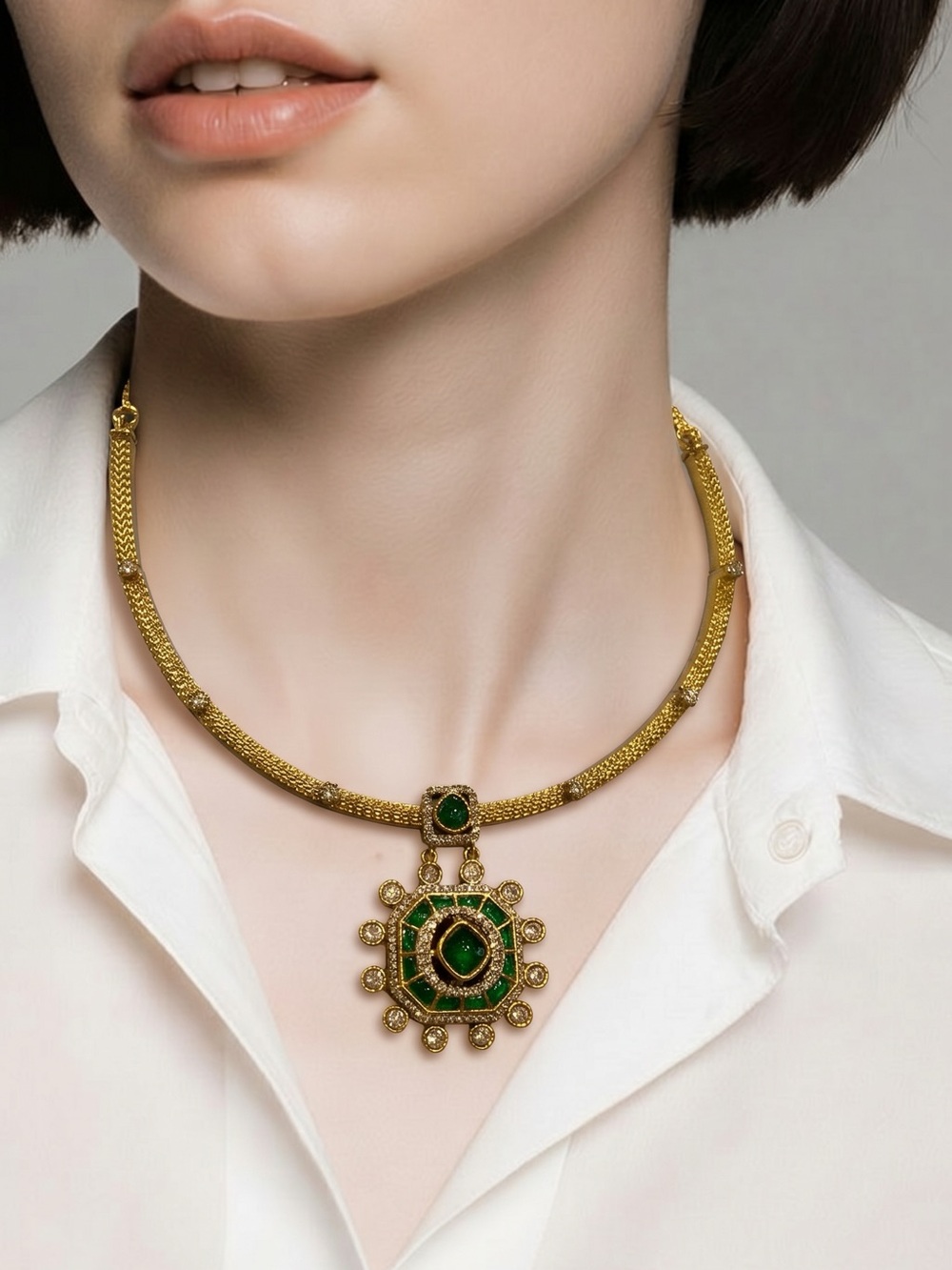Elegant Gold-Tone Necklace with Green Pendant and earrings.